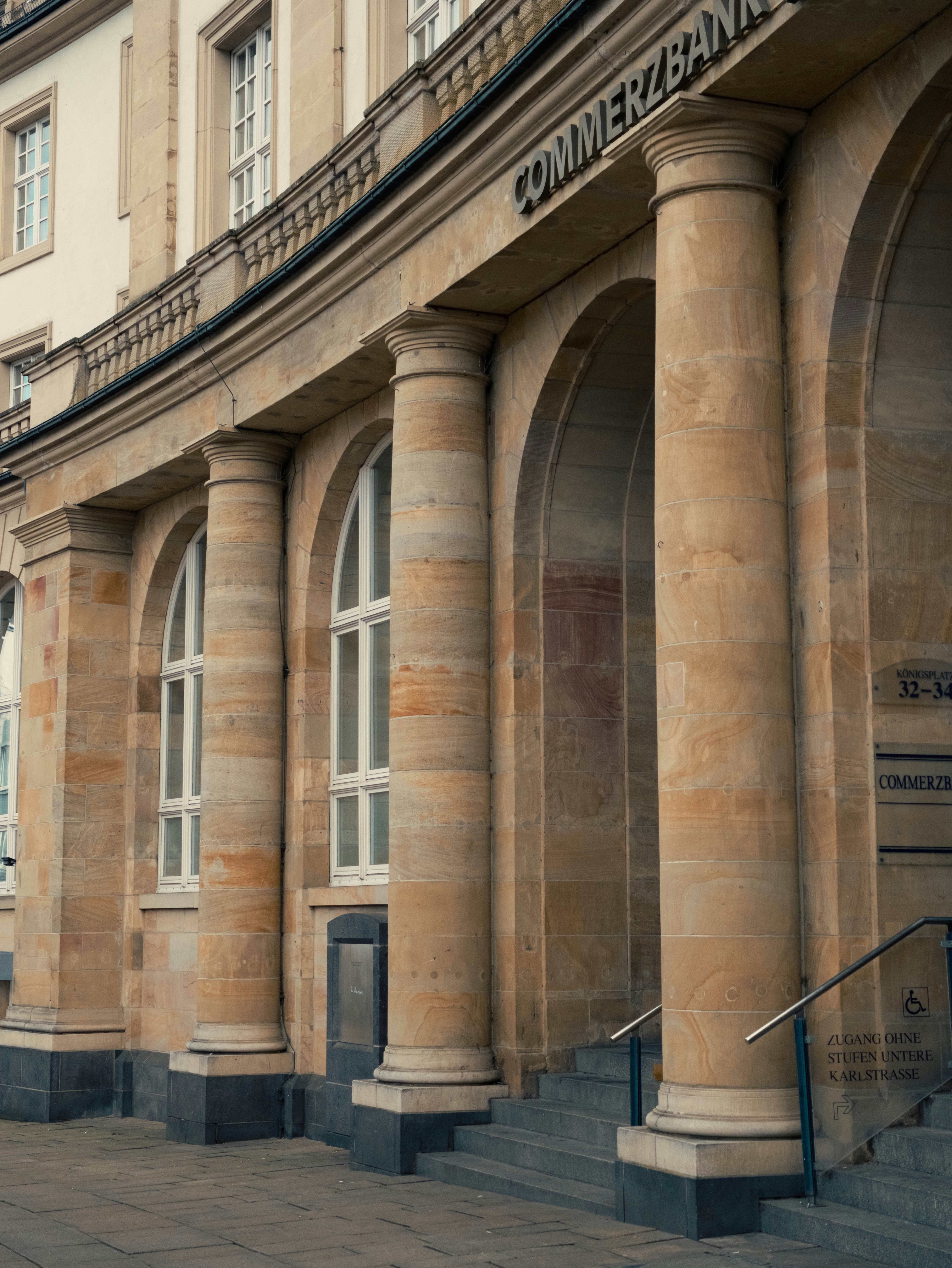 Classical building facade with arched windows and columns